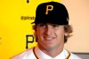 FILE- In this June 11, 2019, file photo, Pittsburgh Pirates first-round draft pick, Quinn Priester, a right-handed pitcher out if Cary-Grove High School in Cary Illinois, answers questions during a news conference at PNC Park in Pittsburgh. Priester is already daydreaming about playoff games at PNC Park. Still, the Pittsburgh Pirates top pitching prospect knows there's plenty of work to do to make that dream a reality. (AP Photo/Gene J. Puskar, File)