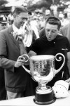FILE - In this July 22, 1962, file photo, Gary Player lifts the top of the PGA trophy after winning the Championship at Aronimink Golf Club at Newton Square, Pa. At left is Lou Strong, Professional Golfer's Association president. Player was back Saturday at Aronimink Golf Club, home of this weekend's Women's PGA Championship, and the site of his 1962 PGA Championship victory. (AP Photo/File)