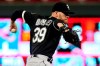 FILE - In this Sept. 17, 2019, file photo, Chicago White Sox pitcher Aaron Bummer throws against the Minnesota Twins during a baseball game in Minneapolis. Bummer used that heavy sinker to become one of the AL's most reliable relievers last year, compiling a 2.13 ERA and his first career save in 58 appearances. (AP Photo/Jim Mone, File)