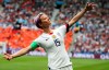 FILE - In this July 7, 2019 file photo, United States' Megan Rapinoe celebrates after scoring the opening goal from the penalty spot during the Women's World Cup final soccer match against The Netherlands at the Stade de Lyon in Decines, outside Lyon, France. Rapinoe has returned to the U.S. national team after sitting out most of last year following the SheBelieves Cup tournament, joining the squad for its January training camp in Florida. (AP Photo/Francisco Seco, File)
