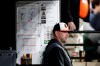 FILE - In this Sept. 19, 2019, file photo, Baltimore Orioles manager Brandon Hyde watches from the dugout during the seventh inning of a baseball game against the Toronto Blue Jays in Baltimore. Hyde enters his second spring training as manager of the Baltimore Orioles with the same goal as last year: to oversee the rebuild of a last-place team that lost more than 100 games. (AP Photo/Julio Cortez, File)