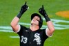 FILE - In this Sept. 9, 2020, file photo, Chicago White Sox's James McCann (33) celebrates as he crosses home plate after hitting a solo home run off Pittsburgh Pirates starting pitcher JT Brubaker during the third inning of a baseball game in Pittsburgh. Free agent catcher James McCann and the New York Mets were close to completing a $40 million, four-year contract Saturday, Dec. 12, 2020, as the team continues to upgrade its roster under new owner Steve Cohen. A person close to the deal confirmed the details to The Associated Press under condition of anonymity because there was no official announcement. (AP Photo/Gene J. Puskar, File)
