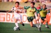 FILE - In this Sept. 15, 1996, file photo, Los Angeles Galaxy's Mauricio Cienfuegos (10) pursues San Jose Clash's Eric Wynalda during the first half of an MLS soccer game at the Rose Bowl in Pasadena, Calif. Before the first-ever Major League Soccer match on April 6, 1996, a group of Clash players went to a trendy San Jose restaurant for some pre-game bonding, and four of them threw up after the meal. But it had nothing to do with the food, recalled Wynalda. 