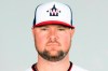 FILE - This is a Friday, Feb. 26, 2021, photo showing Jon Lester of the Washington Nationals baseball team. Nationals manager Dave Martinez said Lester has been playing catch on flat ground and soon should be able to throw off a mound again to work his way into form for the regular season, which begins April 1. The Nationals left-hander had surgery to remove a thyroid gland. (Mary DeCicco/MLB Photos via AP, Pool, File)