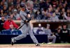 FILE - In this April 2, 2019, file photo, Arizona Diamondbacks pitcher Zack Greinke hits a three-run home run during the fourth inning of a baseball game against the San Diego Padres in San Diego. While pitchers have always been viewed as the weakest link in the batting order, there was a time when they weren't automatic outs. (AP Photo/Orlando Ramirez, File)