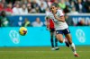 FILE - In this March 8, 2020, file photo, United States forward Lynn Williams (13) chases after the ball during the second half of a SheBelieves Cup soccer match against Spain in Harrison, N.J. Williams had her momentum with the U.S. national team stalled by the coronavirus pandemic. She was hoping to earn a spot on the Olympic team this past summer. But the one-year delay has given her time to work on different aspects of her game. (AP Photo/Steve Luciano, File)