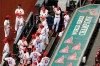 FILE - In this July 24, 2020, file photo, members of the St. Louis Cardinals wait to be introduced before the start of a baseball game against the Pittsburgh Pirates in St. Louis. The Cardinals 4-game series at Detroit was postponed Monday, Aug. 3, 2020, after more Cardinals players and staff staffers test positive for COVD-19. The series was to have been played in Detroit from Tuesday through Thursday. (AP Photo/Jeff Roberson, File)