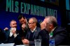 FILE - In this Nov. 19, 2019, file photo, from left, Nashville SC assistant general manager, Ally MacKay, general manager Mike Jacobs, head coach Gary Smith, and CEO Ian Ayre talk before making the team's first selection during the Major League Soccer expansion draft in Nashville, Tenn. Nashville SC opens their inaugural MLS season on Saturday. (AP Photo/Mark Zaleski, File)