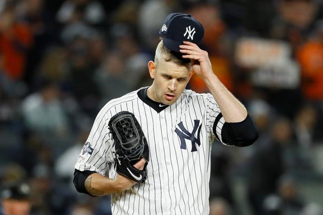 FILE - In this Oct. 18, 2019, file photo, New York Yankees starting pitcher James Paxton reacts after walking Houston Astros' Michael Brantley during the first inning in Game 5 of baseball's American League Championship Series in New York. Paxton has had back surgery and is expected to be sidelined until May or June. (AP Photo/Matt Slocum, File)