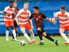 FILE - In this Nov. 15, 2020, file photo, provided by VTAthletics, Virginia Tech's Daniel Pereira dribbles the ball during an NCAA college soccer game against Clemson in Durham, N.C. Austin FC, The newest MLS franchise selected the talented Virginia Tech midfielder Daniel Pereira with the top pick in the league's SuperDraft on Thursday, Jan. 21, 2021. (Dave Knachel/VTAthletics via AP, File)