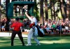 FILE - In this April 10, 2005, file photo, Tiger Woods celebrates with his caddie Steve Williams after his chip-in birdie on the 16th hole during the Masters golf tournament at Augusta National Golf Club in Augusta, Ga. The chip-in is among his most famous moments at the Masters. (AP Photo/Elise Amendola, File)