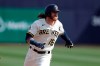 FILE - In this Feb. 27, 2020, file photo, Milwaukee Brewers' Ben Gamel runs during the third inning of a spring training baseball game against the Kansas City Royals in Phoenix. The Cleveland Indians and Gamel agreed to a minor league contract on Thursday, Feb. 11, 2021, and he was invited to big league spring training camp. The 27-year-old has played 442 major league games for the Yankees, Mariners and Brewers. (AP Photo/Gregory Bull, File)