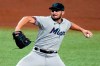 FILE - In this Sept. 4, 2020, file photo, Miami Marlins relief pitcher Alex Vesia (96) throws during the fifth inning of a baseball game in St. Petersburg, Fla. Well-traveled right-handed reliever Dylan Floro was traded Friday, Dec. 12, 2021, by the Los Angeles Dodgers to the Miami Marlins for left-handed reliever Alex Vesia and pitching prospect Kyle Hurt. (AP Photo/Chris O'Meara, File)