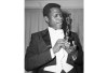 FILE - Actor Sidney Poitier appears with his Oscar for best actor, for his role in 