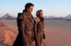 This image released by Warner Bros. Entertainment shows Timothee Chalamet, left, and Rebecca Ferguson in a scene from 
