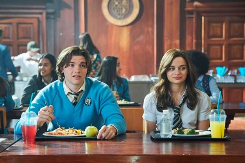 This image released by Netflix shows Joel Courtney, left, and Joey King in a scene from 