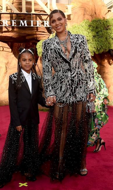 FILE - Beyonce, right, and her daughter Blue Ivy Carter arrive at the world premiere of