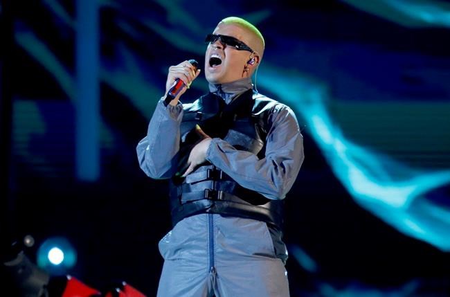 FILE - Bad Bunny performs a medley at the Billboard Latin Music Awards in Las Vegas on April 25, 2019. Bad Bunny will perform at this month's Grammy Awards. (Photo by Eric Jamison/Invision/AP, File)