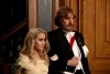 This image released by Amazon Studios shows Maria Bakalova, left, and Sacha Baron Cohen in a scene from 