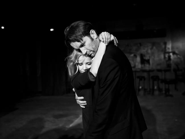 This image released by Amazon Studios shows Joanna Kulig, left, and Tomasz Kot in a scene from