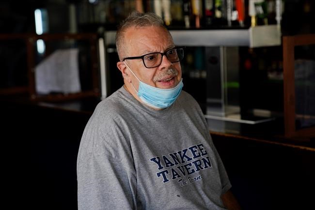 Joe Bastone, owner of Yankee Tavern, responds to questions during an interview Friday, Aug. 14, 2020, in New York. (AP Photo/Frank Franklin II)
