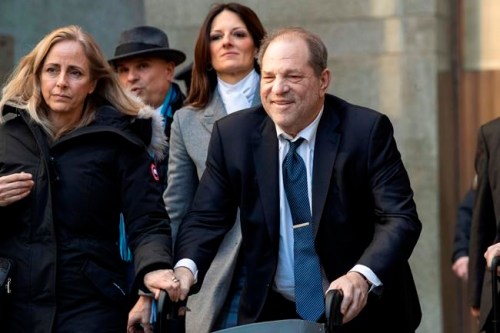 FILE - In this Feb. 21, 2020, file photo, Harvey Weinstein leaves the courthouse during jury deliberations in his rape trial in New York. With Weinstein facing sentencing this week, his lawyers argued Monday, March 9, that the disgraced movie mogul deserves mercy in his New York City rape case because he's already suffered a 