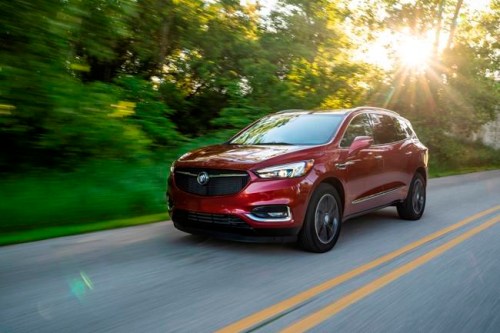 This undated photo from Buick shows the Enclave, a midsize three-row SUV that gets an EPA-estimated 21 mpg in mixed driving conditions. The Buick Enclave is related to another big General Motors SUV: the Chevrolet Traverse. Both provide a huge amount of cargo space for a three-row SUV, with the Enclave checking in at 23.6 (minimum) and 97.6 (maximum) cubic feet. (Courtesy of General Motors via AP)