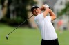 Xinjun Zhang, of China, tees off on the 3rd hole during the first round of the Travelers Championship golf tournament at TPC River Highlands, Thursday, June 25, 2020, in Cromwell, Conn. (AP Photo/Frank Franklin II)