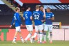 Everton's Richarlison (7) is congratulated by teammates after scoring a goal against Sheffield United during the English Premier League soccer match between Sheffield United and Everton at Bramall Lane in Sheffield, England, Monday, July 20, 2020. (AP Photo/Peter Powell, Pool)