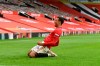 Manchester United's Mason Greenwood celebrates after scoring a goal during the English Premier League soccer match between Manchester United and Bournemouth at Old Trafford stadium in Manchester, England, Saturday, July 4, 2020. (Peter Powell/Pool via AP)