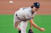 New York Yankees pitcher Gerrit Cole delivers against the Tampa Bay Rays during the first inning in Game one of a baseball American League Division Series Monday, Oct. 5, 2020, in San Diego. (AP Photo/Jae C. Hong)