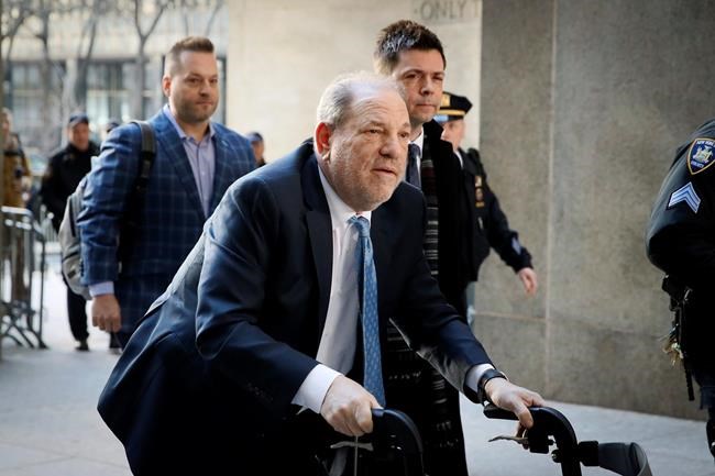 Harvey Weinstein arrives at a Manhattan courthouse as jury deliberations continue in his rape trial, Monday, Feb. 24, 2020, in New York. (AP Photo/John Minchillo)