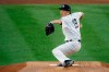 New York Yankees starting pitcher Masahiro Tanaka throws in the first inning of a baseball game against the Boston Red Sox, Saturday, Aug. 1, 2020, in New York. (AP Photo/John Minchillo)