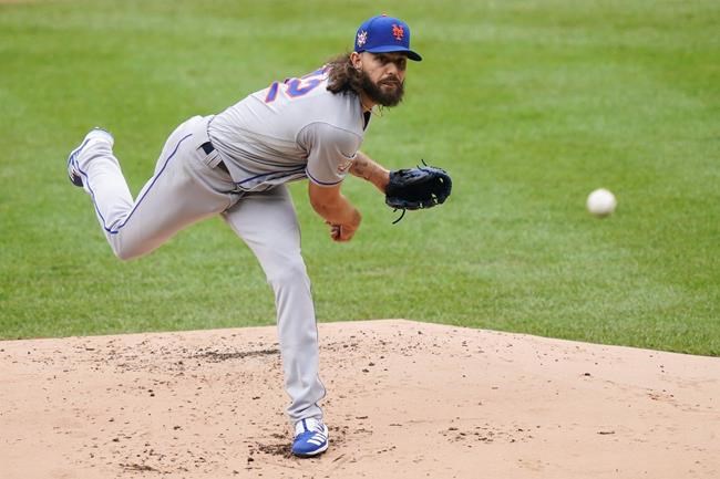 New York Mets starting pitcher Robert Gsellman throws in the first inning of a baseball game against the New York Yankees, Saturday, Aug. 29, 2020, in New York. (AP Photo/John Minchillo)