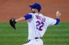 New York Mets starting pitcher Rick Porcello winds up during the third inning of the team's baseball game against the Philadelphia Phillies, Friday, Sept. 4, 2020, in New York. (AP Photo/John Minchillo)