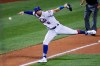 New York Mets third baseman Jeff McNeil bobbles a go-ahead RBI single by Boston Red Sox's Mitch Moreland in the eighth inning of a baseball game, Wednesday, July 29, 2020, in New York. (AP Photo/John Minchillo)
