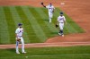 New York Mets left fielder Dominic Smith (2) tips his hat to the Miami Marlins as both teams walk off the field before a scheduled baseball game Thursday, Aug. 27, 2020, in New York. Players jointly walked off the field after a moment of silence, draping a Black Lives Matter T-shirt across home plate as they chose not to play. (AP Photo/John Minchillo)