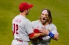 Philadelphia Phillies' Bryce Harper, right, reacts alongside Neil Walker (12) after being thrown out of the team's baseball game against the New York Mets by umpire Roberto Ortiz during the fifth inning Saturday, Sept. 5, 2020, in New York. (AP Photo/John Minchillo)