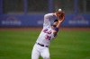 New York Mets right fielder Michael Conforto catches a fly ball in the rain during the first inning of a baseball game at Citi Field, Sunday, April 11, 2021, in New York. The game was delayed at the top of the first inning due to rain. (AP Photo/Seth Wenig)