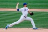 New York Mets starting pitcher Jacob deGrom winds up during the first inning of a baseball game against the Miami Marlins at Citi Field, Sunday, Aug. 9, 2020, in New York. (AP Photo/Kathy Willens)
