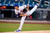 New York Mets' Jacob deGrom watches a pitch during the first inning of the team's baseball game against the Washington Nationals on Friday, April 23, 2021, in New York. (AP Photo/Frank Franklin II)