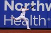 New York Mets left fielder Jeff McNeil injures himself while catching a fly ball during the first inning of a baseball game against the Washington Nationals at Citi Field, Thursday, Aug. 13, 2020, in New York. (AP Photo/Seth Wenig)