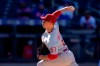 Philadelphia Phillies' Chase Anderson delivers a pitch during the first inning of a baseball game against the New York Mets in the first game of a doubleheader Tuesday, April 13, 2021, in New York. (AP Photo/Frank Franklin II)