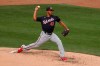 Washington Nationals' Joe Ross delivers a pitch during the third inning of a baseball game against the New York Mets, Saturday, April 24, 2021, in New York. (AP Photo/Jason DeCrow)