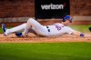 New York Mets' Billy McKinney scores against the Chicago Cubs on a double by Kevin Pillar during the second inning of a a baseball game Wednesday, June 16, 2021, in New York. (AP Photo/Frank Franklin II)