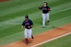 Christian Vazquez, right, and Xander Bogaerts celebrate as they approach home plate after Bogaerts hit a two-run homer run during the fourth inning of the baseball game against the New York Mets at Citi Field, Thursday, July 30, 2020, in New York. (AP Photo/Seth Wenig)