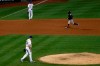 New York Mets pitcher Paul Sewald (51) walks near the mound after giving up a two-run home run to Atlanta Braves' Ozzie Albies, right, during the seventh inning of a baseball game Sunday, July 26, 2020, in New York. (AP Photo/Adam Hunger)
