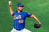 New York Mets starting pitcher Jacob deGrom (48) winds up while delivering a pitch during a simulated game, part of the Mets summer training camp workout at Citi Field, Thursday, July 9, 2020, in New York. (AP Photo/Kathy Willens)