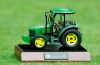 FILE - In this Saturday, July 13, 2013 file photo, A John Deere tractor tee marker is seen during the third round of the John Deere Classic golf tournament at TPC Deere Run in Silvis, Ill. Officials decided Thursday, May 28, 2020 to cancel this year's tournament. (AP Photo/Charlie Neibergall, File)