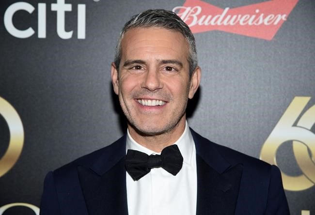 FILE - In this Wednesday, Sept. 25, 2019 file photo, Television personality Andy Cohen attends the 60th annual Clio Awards at The Manhattan Center in New York. Former star of “The Bachelor” Colton Underwood and talk-show host Andy Cohen have joined the growing group of celebrities who have tested positive for coronavirus, Friday, March 20, 2020. (Photo by Evan Agostini/Invision/AP, File)